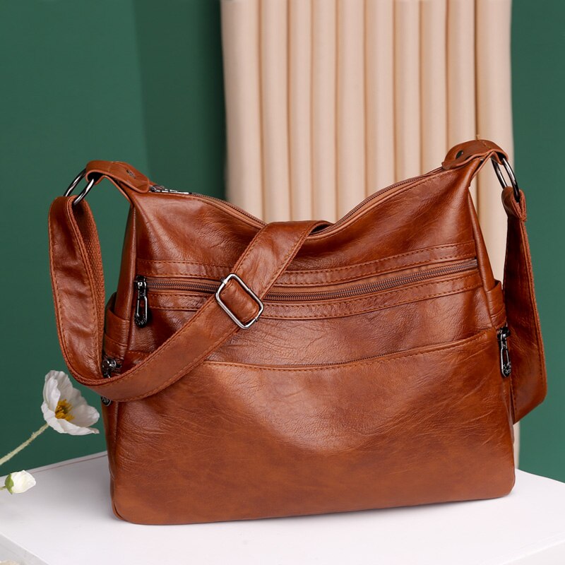 💟【45% ОТСТЪПКА】👜Нова модна мека кожена чанта за през рамо
